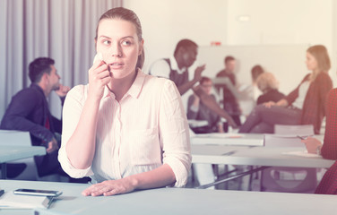 Frustrated woman student in classroom