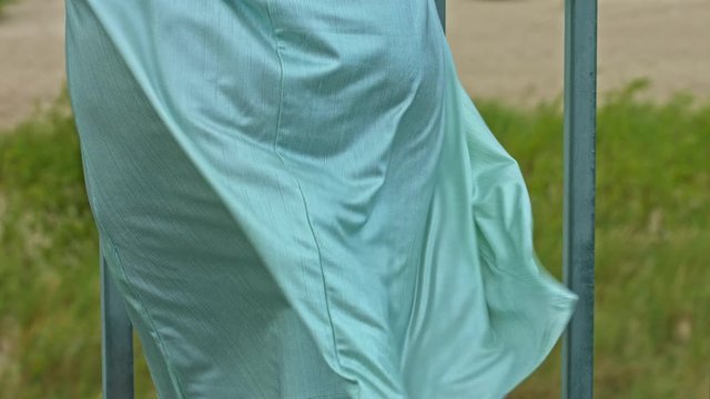 Womans Dress blowing in the wind slow motion,close up shot