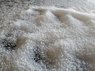 Background blur white urea pile.