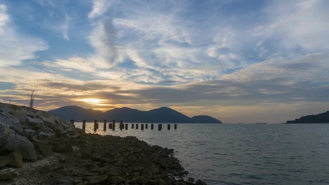 Timelapse of sunset moment at public beach in Marina Island, Malaysia.