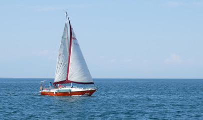 sea view with a sailing boat