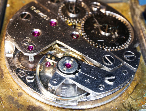Old clock mechanism close-up . Vintage mechanical watch. Macro image. 