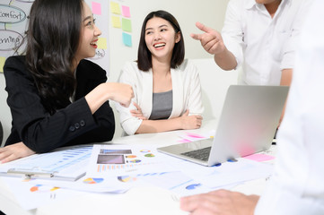 Group young asian businesswoman and businessman people have fun and talking or discuss about work in workplace
