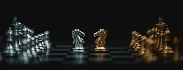 Business competition and strategy plan concept. Chess board game gold and silver colour. Panoramic image - obrazy, fototapety, plakaty