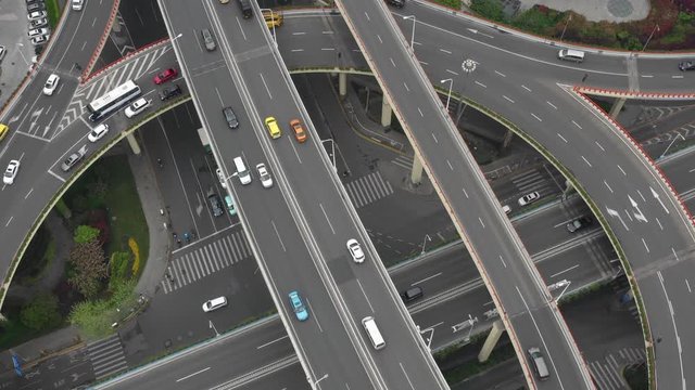 Aerial Video of car traffic and huge elevated road circle multilevel complex, car transportation scene in Shanghai, China in 4K UHD