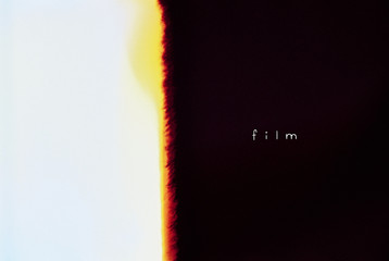 Abstract of the image cut off from light effect for film.Designed film texture background.