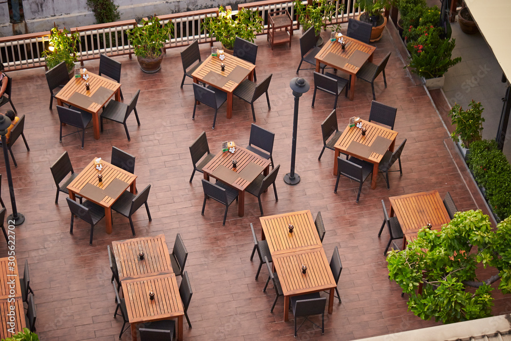 Wall mural restaurant terrace tables at hotel