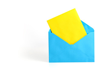 Blue envelope with blank card on white background