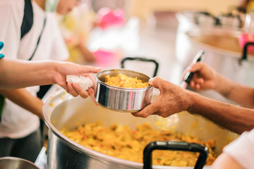 Concepts of donations and feeding: The poor give free donations from donors.