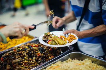 The concept of hunger: Volunteers draw food to donate to hungry people with concern.