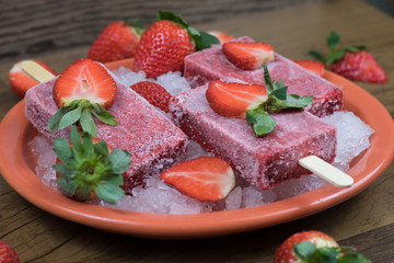delicious strawberry and fresh fruit flavored ice lollipop