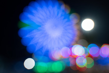 Abstract Bokeh of  Ferris wheel at Amusement park