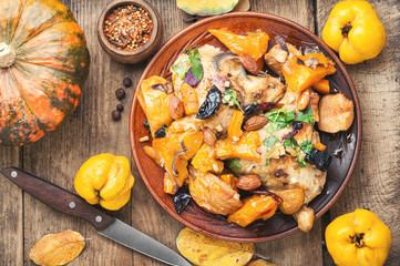 Baked chicken with pumpkin.