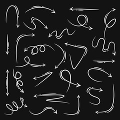 Set of Hand drawn vector arrows doodle on black background.design element vector illustration.