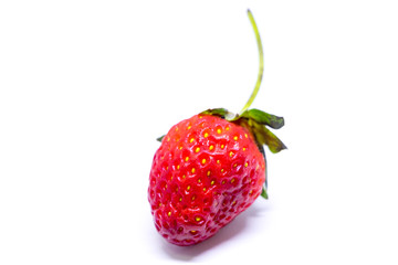 Isolated single strawberry.