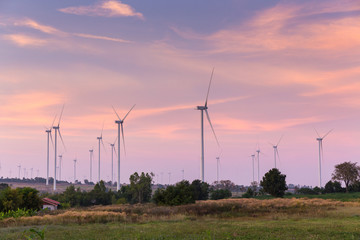 Twilight of Sunset on wind turbines field
