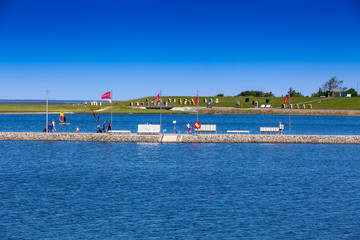 Fototapeta na wymiar View of the beach area of the family lagoon Perlebucht, Büsum, North Sea, Germany