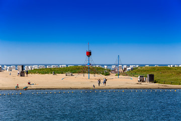 Fototapeta premium View of the beach area of the family lagoon Perlebucht, Büsum, North Sea, Germany