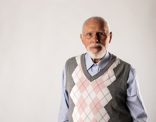 Old man looking at the camera.