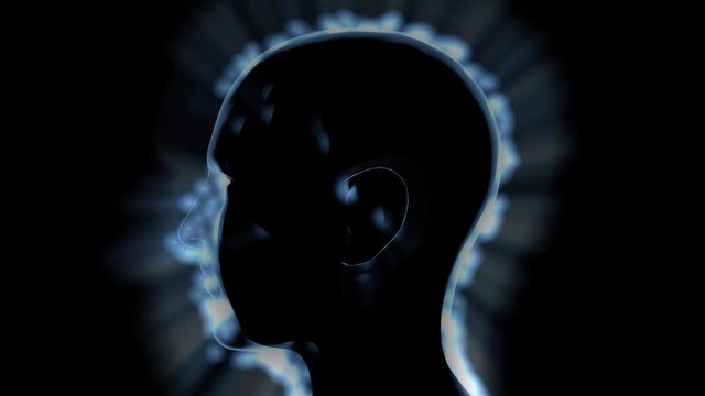 Profile of glowing face with sparkling, twinkling particles and volumetric light rays . Side view .  3d animation