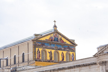 Saint Paul Cathedral facade detail after snowfall in winter.