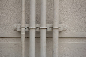 Close view of Pipe system installed in the concrete wall, water transport system in the building
