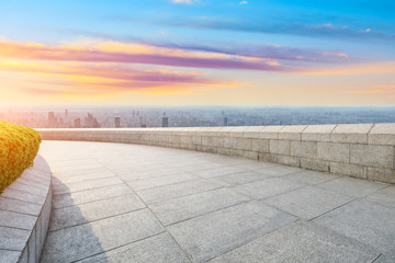 Empty floor and city skyline with beautiful clouds scenery in Shanghai at sunset.high angle view.