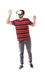 Young man with virtual reality glasses on white background