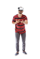 Young man with virtual reality glasses on white background