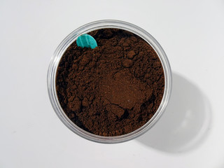 A plastic cup of coffee