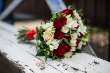 wedding decorations and decorations, the bride's bouquet, lies and waits until the bride wears her wedding dress