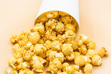  paper bucket of popcorn on  color background