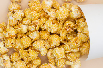  paper bucket of popcorn on  color background