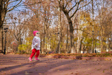 Fototapeta premium happy baby running in the nature