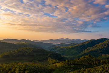 Naklejka na ściany i meble Aerial landscape with sunrise in the morning located in Maehongsan province, Thailand.