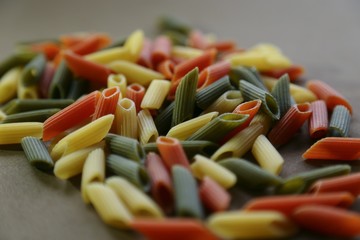 Flour product - pasta red yellow and green ready for preparation