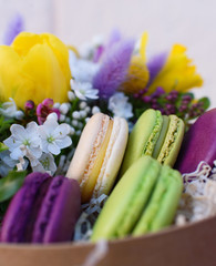  Flowers and colorful macaroons cakes as a gift