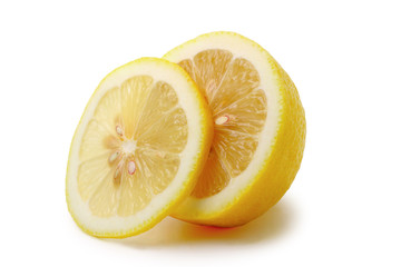 Close up photo of a fresh lemon on white background with shadow. 
