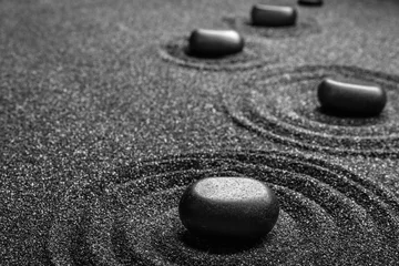 Fototapeten Black sand with stones and beautiful pattern. Zen concept © New Africa