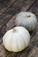 Big beautiful pumpkins on a wooden table. Ingredients. 