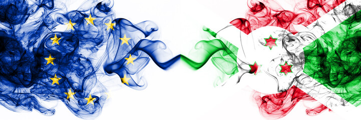Eu, European Union vs Burundi, Burundian smoky mystic flags placed side by side. Thick colored silky abstract smoke flags combination