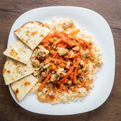 fried fish cake on a white plate photo from the top