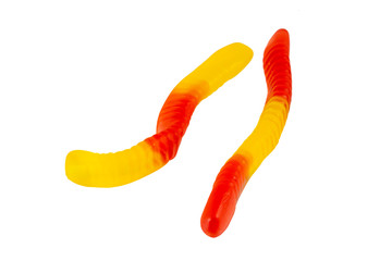 Jelly worms or snakes candies on a white background isolation
