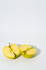 green apple cut in half ideal for background