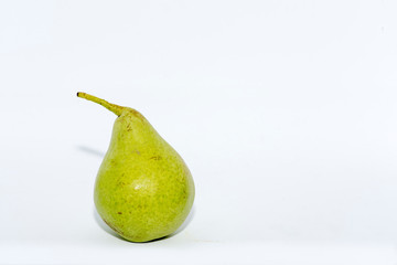green pear on white background