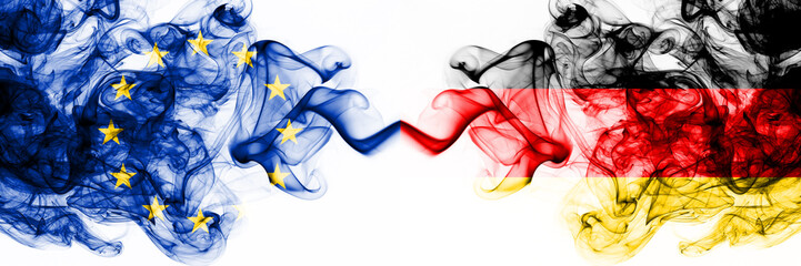 Eu, European Union vs Germany, German smoky mystic flags placed side by side. Thick colored silky abstract smoke flags combination - obrazy, fototapety, plakaty
