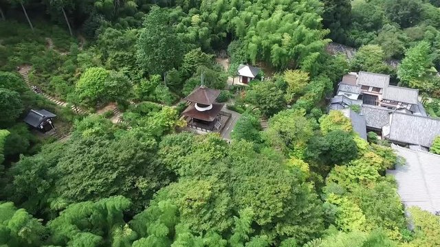 Flying by drone over a Kyoto Temple at a summer day.