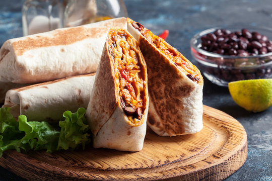 Burritos wraps with mincemeat, beans and vegetables