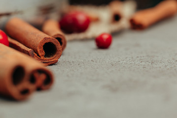 Berries and spices for mulled wine cooking close up on kitchen table