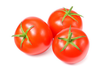 fresh tomatoes isolated on a white background
